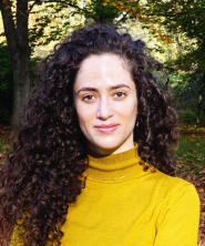 Portrait of Aline Jabbari in black and white in an oval shape.